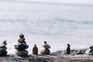 Rock balancing. Psychologist shares what do mental health specialists do. Mindletic blog.