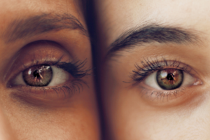 Eyes of two faces photographed close together. Extroverts and introverts - what are the differences? Mindletic Blog