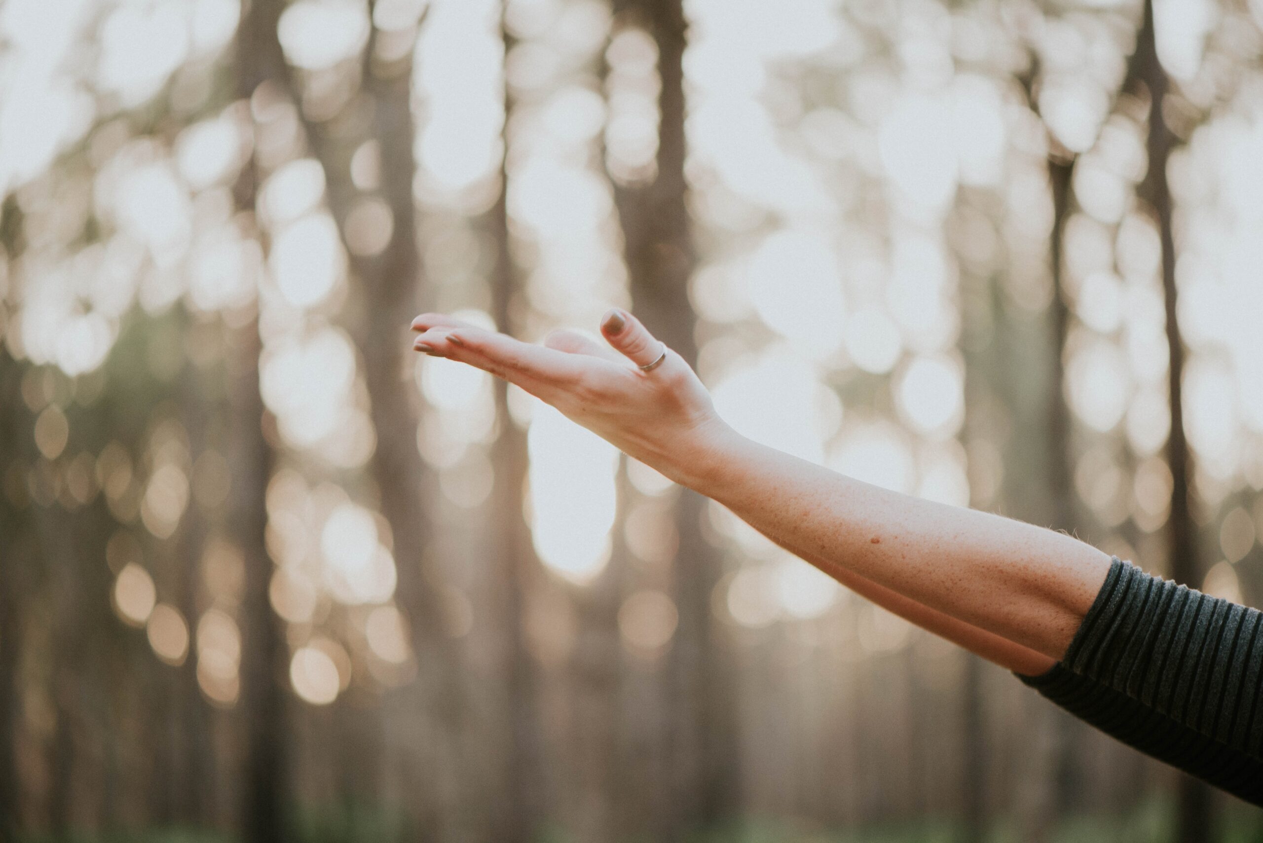 Woman hands raised in front of her. Autumn is most common month of burnouts. Mindletic Blog