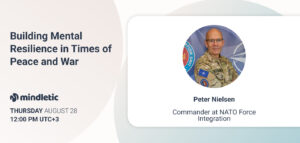 Promotional banner for a talk titled "Building Mental Resilience in Times of Peace and War" featuring Peter Nielsen, Commander at NATO Force Integration. The event is hosted by Mindletic and scheduled for Thursday, August 28 at 12:00 UTC+3. A photo of Peter Nielsen in military uniform is displayed on the right side.